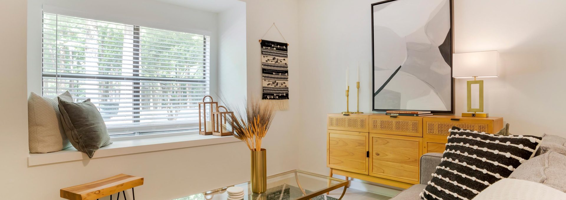 a living room with a couch, coffee table and a lamp at The  Marley