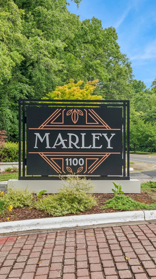 the marley sign in front of a brick building at The  Marley